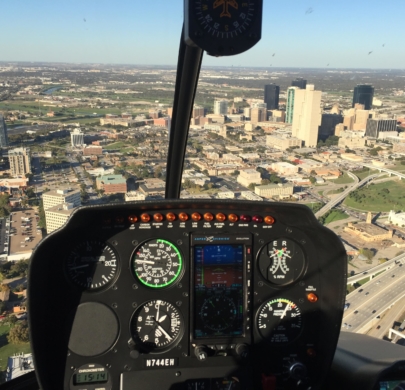 Training helicopter flying over downtown Fort Worth