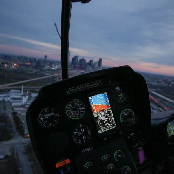 Cockpit of Robinson R66 at night